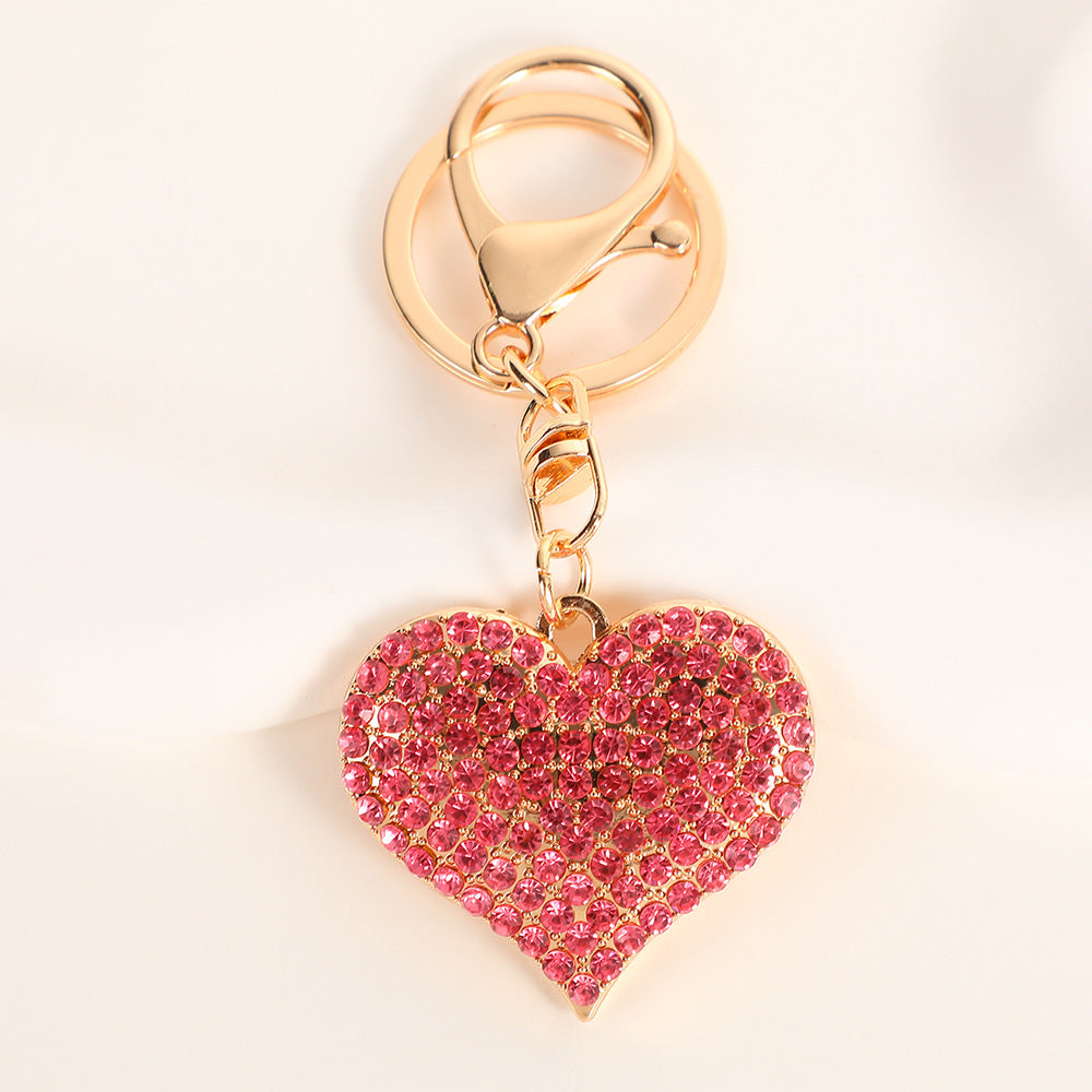 Wholesale Solid color peach heart set with diamonds Metal Keychain