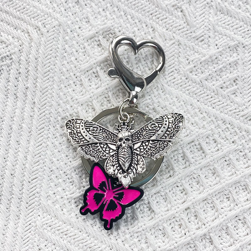 Keychains de mariposa de corazón oscuro al por mayor