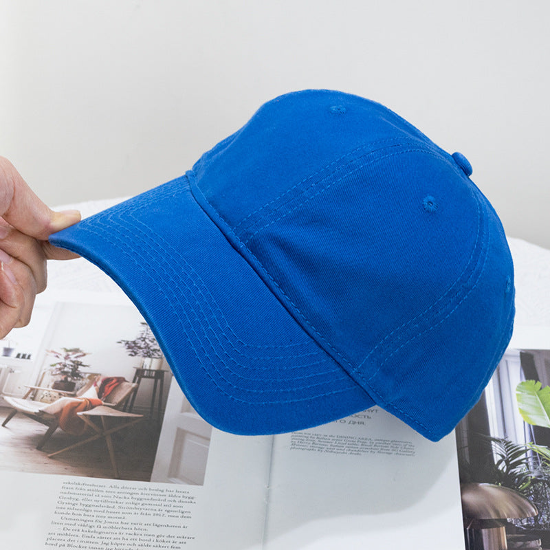 Wholesale Washed Solid Color Soft Top Versatile Curved Brim Baseball Cap