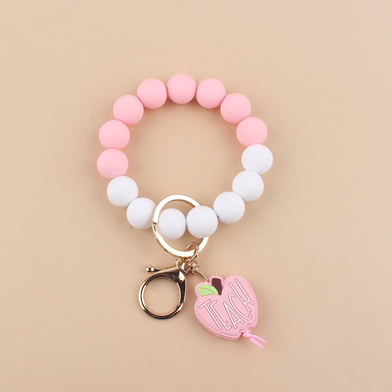 Wholesale Cartoon Apple Teacher Pencil Silicone Beaded Wrist Keychain