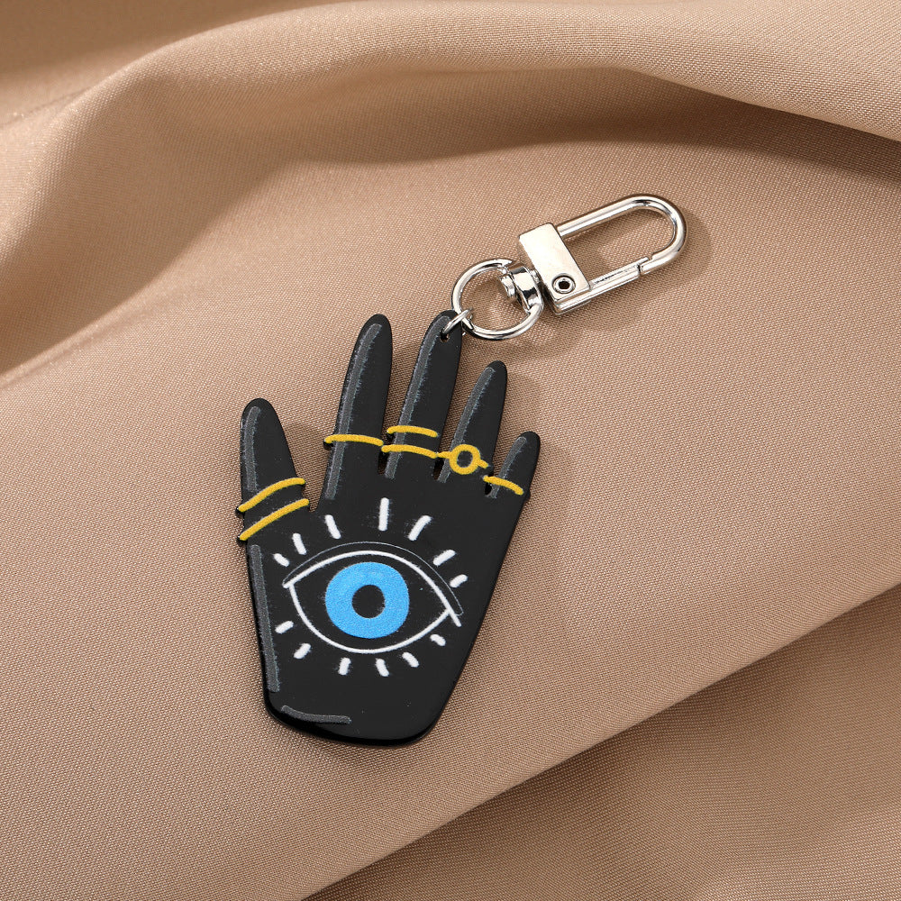 Al por mayor 6 piezas/paquete de viento oscuro Fátima Palm Devil's Eye Plate Keychain