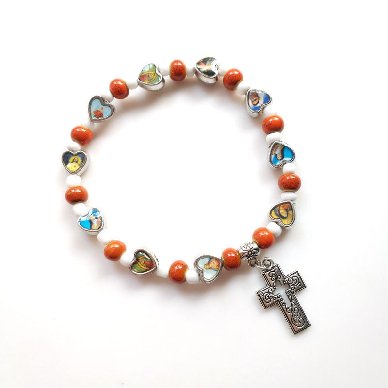 Wholesale Colorful ceramic hollowed-out cross elastic bracelet