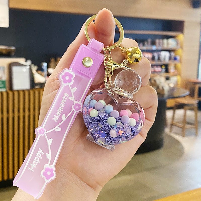 Llavero de aceite de botella de perfume acrílico al por mayor