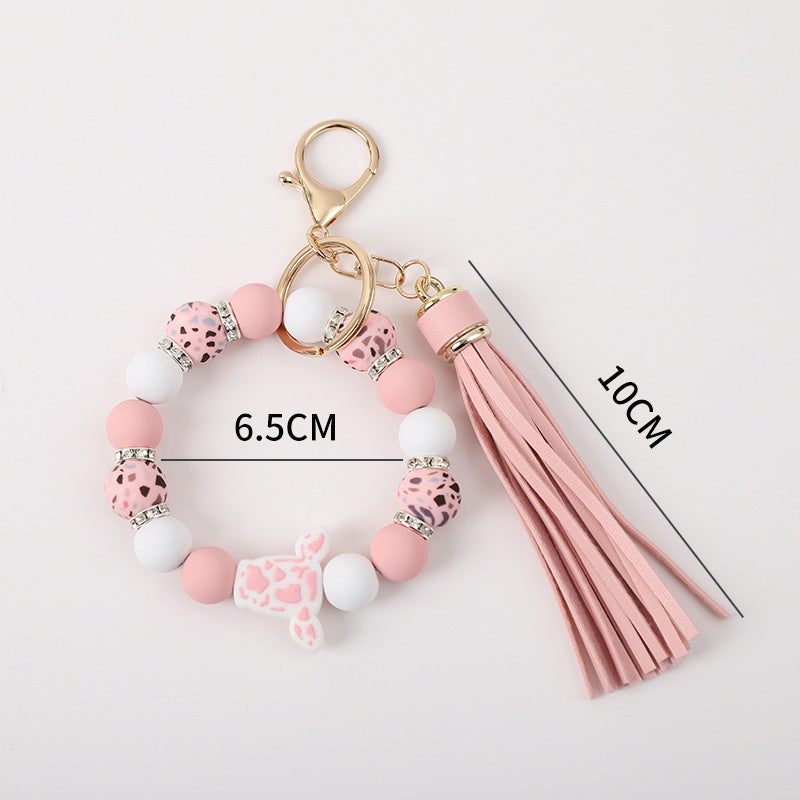 Llavero de muñeca de silicona de borla al por mayor