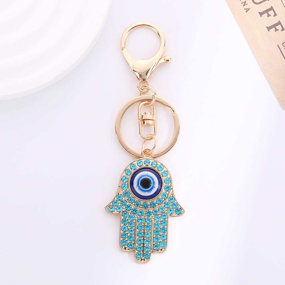 Wholesale Palm Devil' s Eye with Water Diamond Metal Keychain
