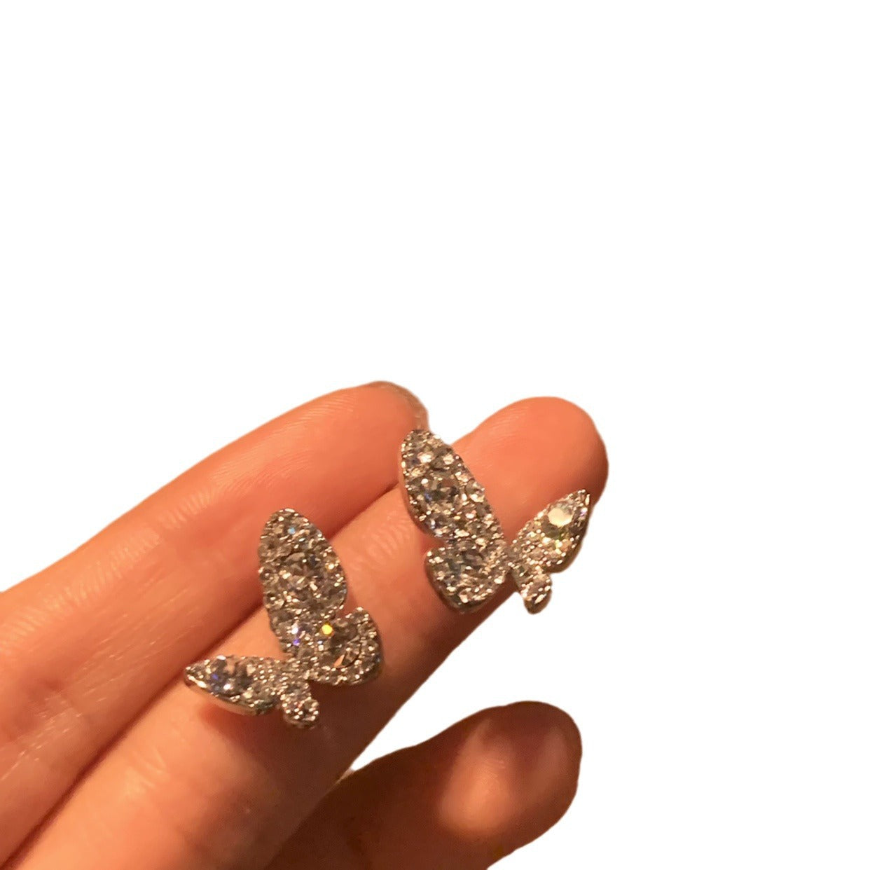 Wholesale Women's shiny butterfly clip earrings with full diamonds