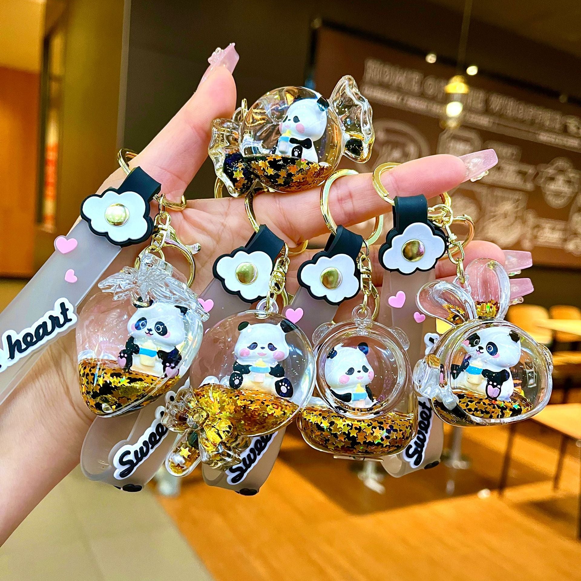 Wholesale Black gold floating cartoon cute panda Liquid Keychains