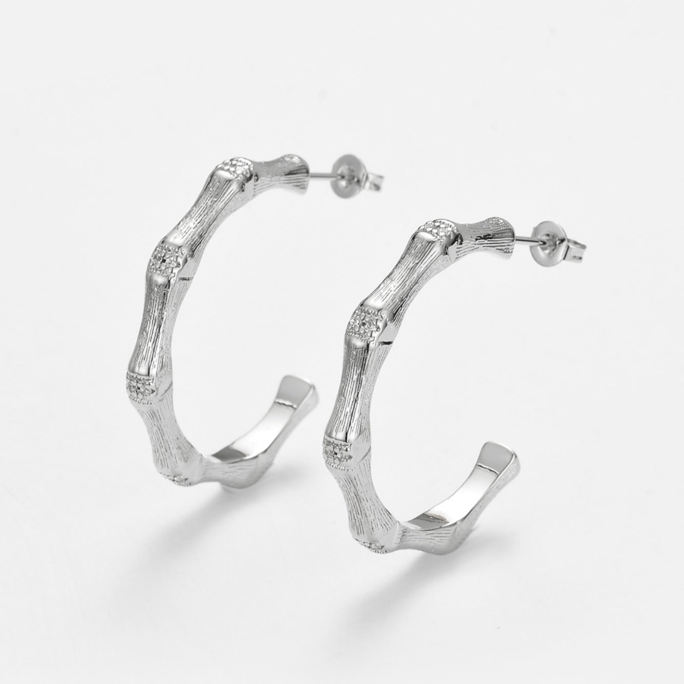 Wholesale Zirconia-set brushed bamboo-shaped earrings for women