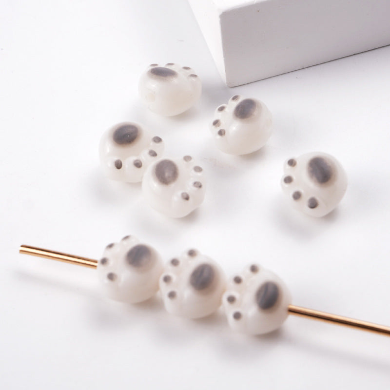 Wholesale 100PCS/PACK Cartoon Cute Three-dimensional Cat Claw Straight Hole Acrylic String Beads