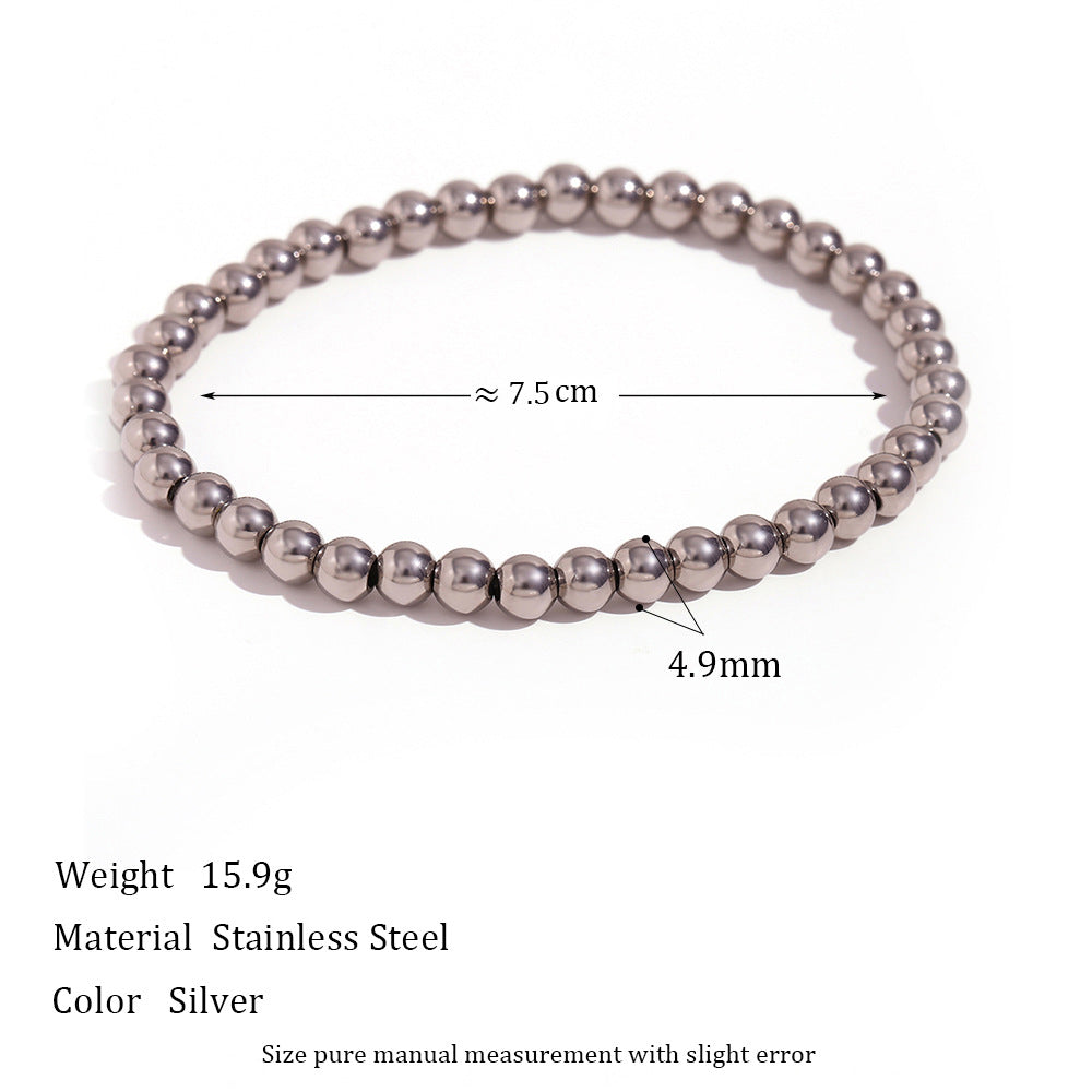 Wholesale Gold and silver colored round bead elastic stainless steel bracelets