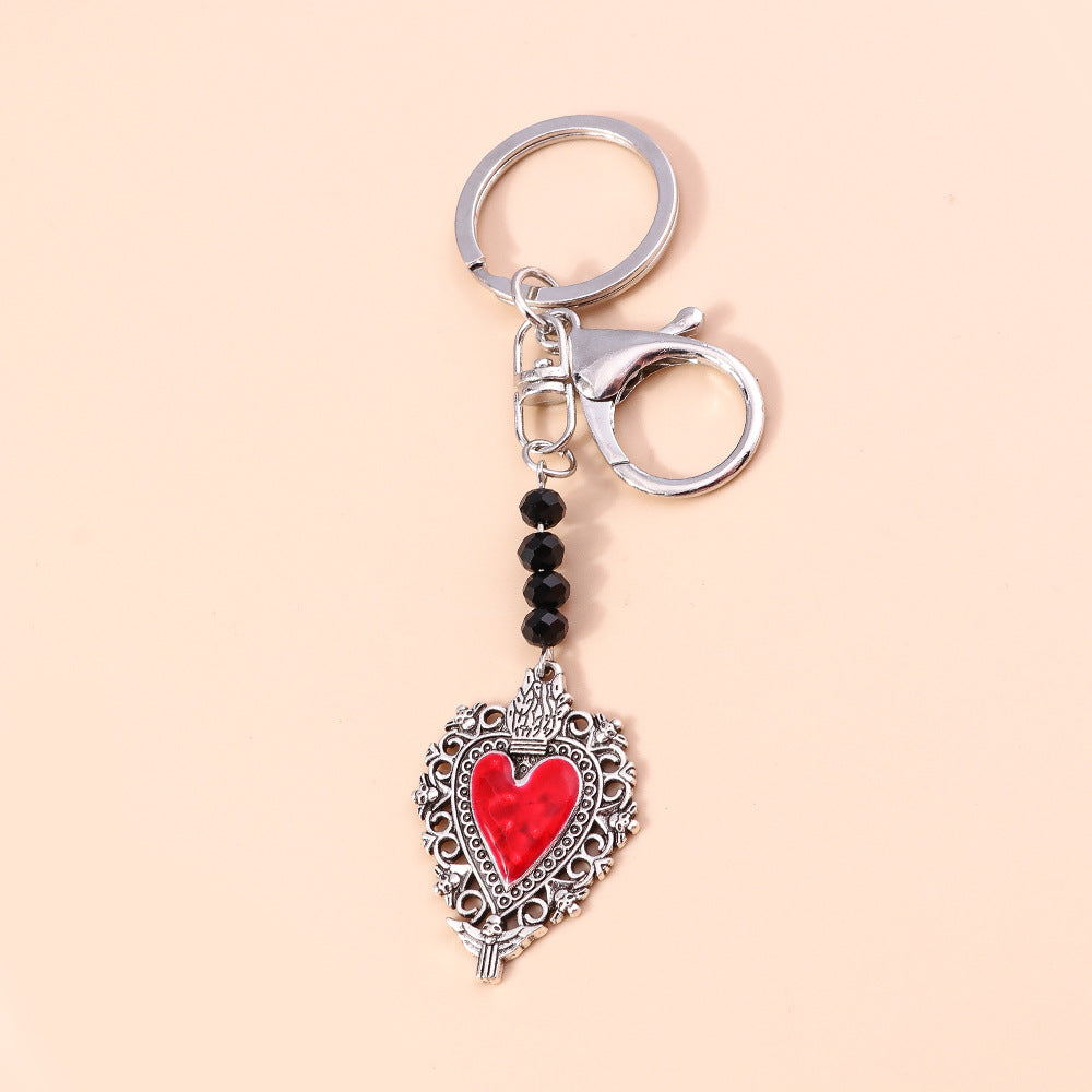 Wholesale Butterfly Cross Hollow Lace Love Devil Eyes Keychain