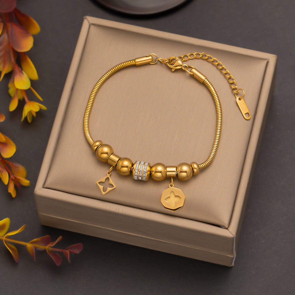 Wholesale Butterfly Eyes Flower Titanium Steel Bracelet