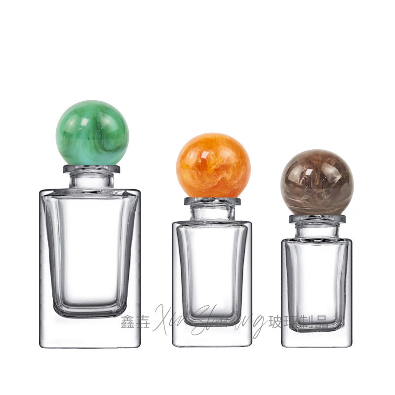 Wholesale 30ml/50ml/100ml transparent high-end perfume packaging glass bottle press spray nozzle perfume bottle