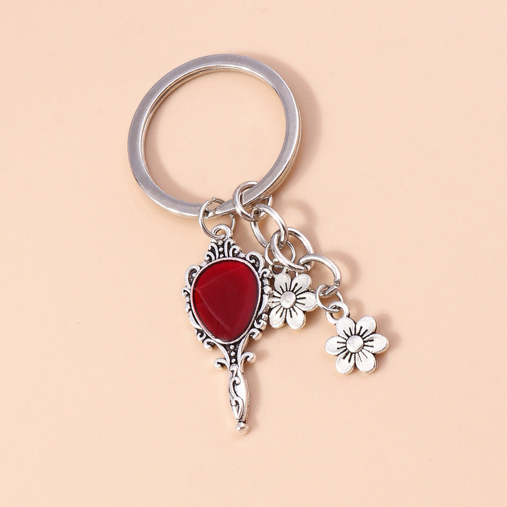 Wholesale Butterfly Cross Hollow Lace Love Devil Eyes Keychain