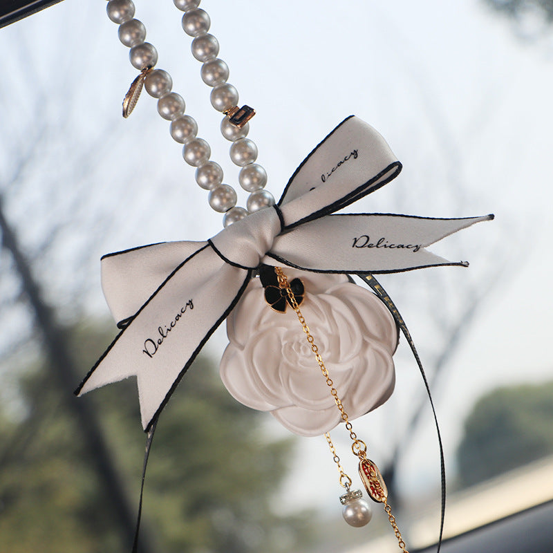 Wholesale Camellia Car Fragrance Expanding Stones Pendant