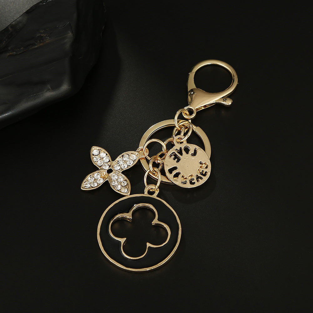 Wholesale Diamond-drip Oil Crystal Quatrefoil Zinc Alloy Keychain