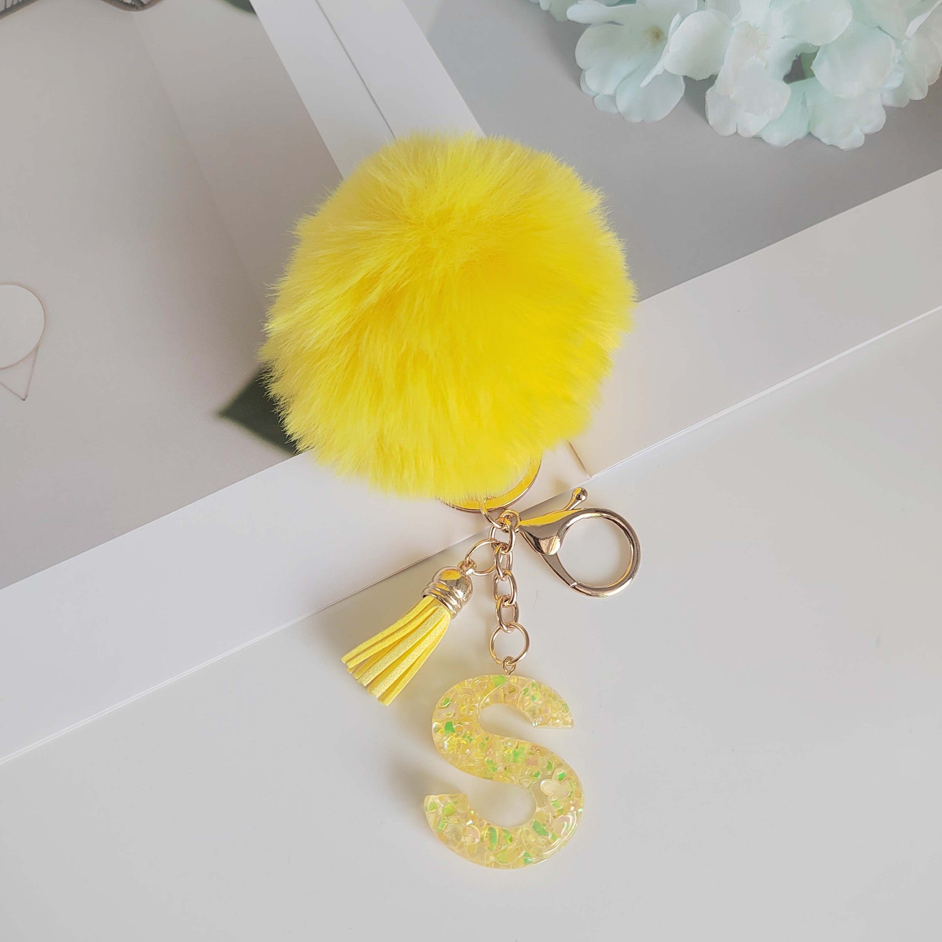 Wholesale Yellow letter ball pendant flower shaped letter keychain