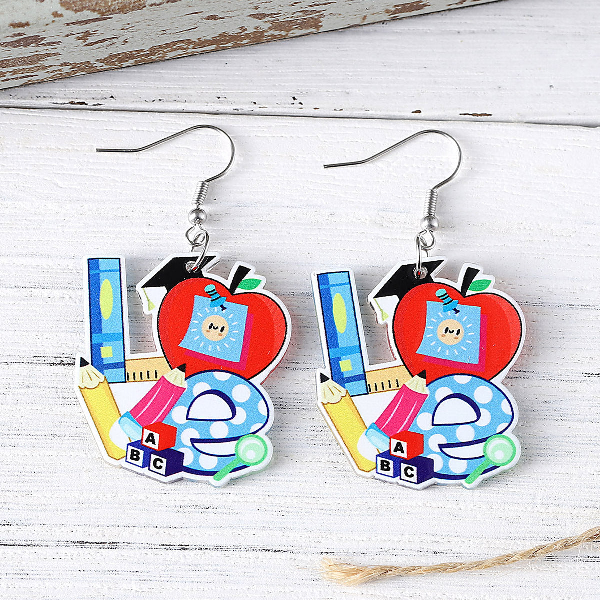 Acrylic pendant earrings are back to school season