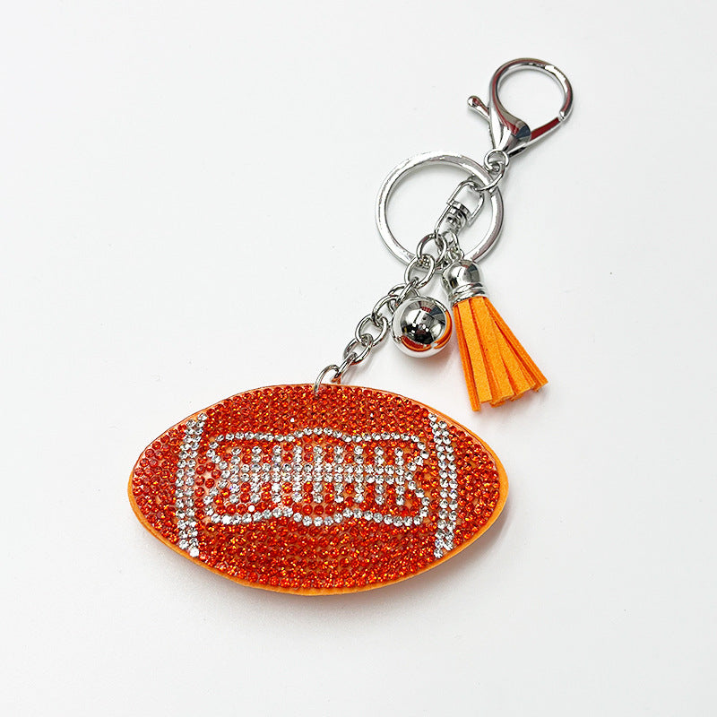 Wholesale Rhinestone rugby ball pendant with rhinestone tassels,  sporty bag accessory.