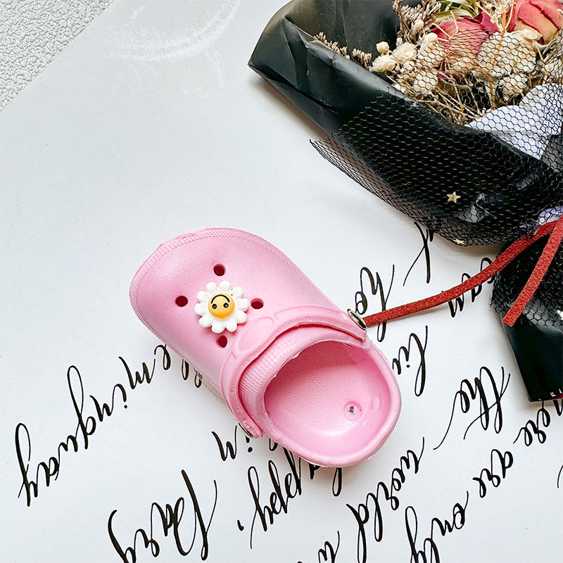 Zapatillas de cara sonrientes al por mayor soporte de airbag de teléfono móvil de plástico