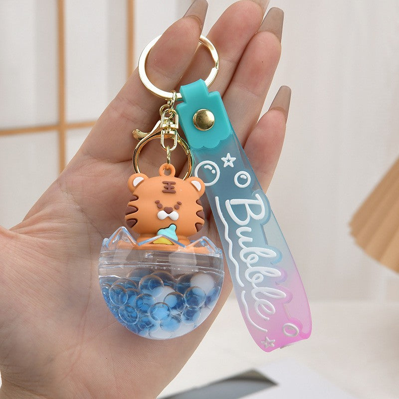 Wholesale Acrylic flowing sand bottle bag keychain