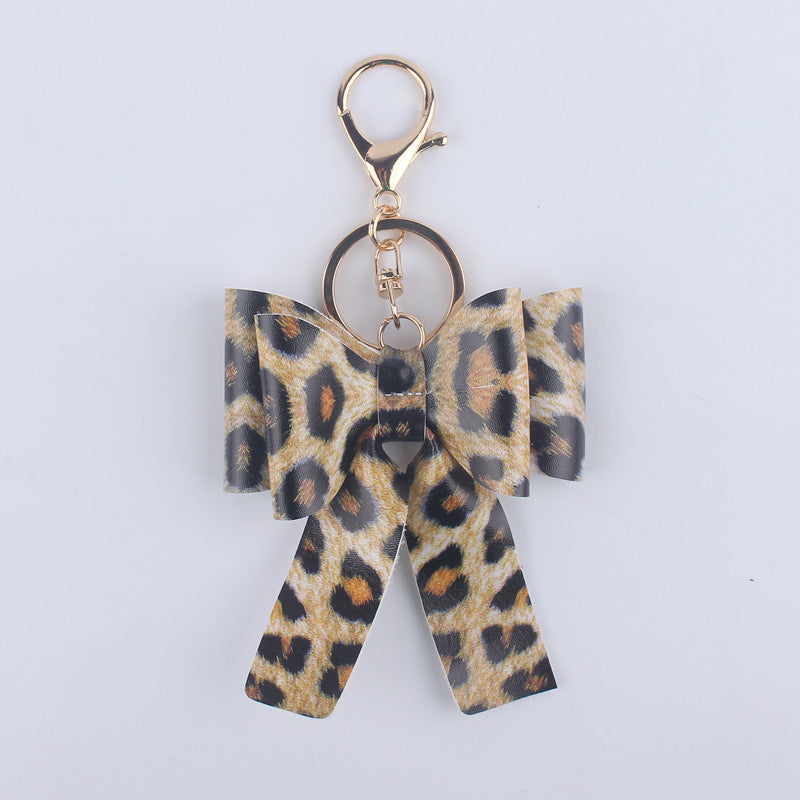 Wholesale Cartoon Aztec Color Bow Leather Keychain