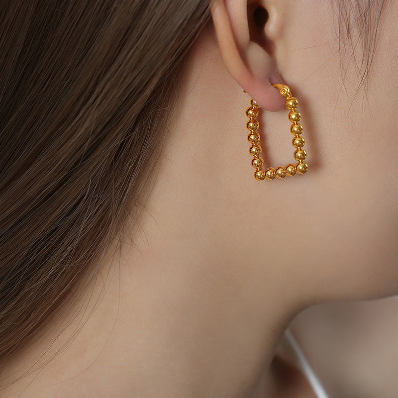 Wholesale Titanium Steel 18k Gold Vintage Steel Ball U-shaped Non-fading Earrings