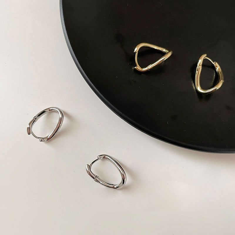 Círculos irregulares al por mayor Pendientes de cobre