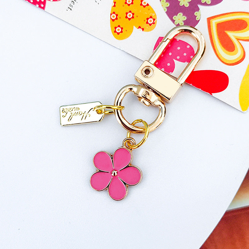 Wholesale Metal Raised Flower Keychains