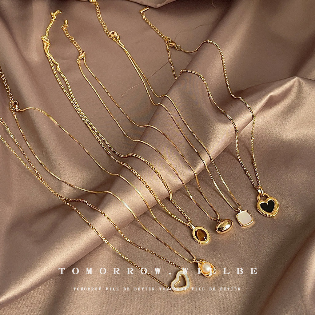 Wholesale Electroplated natural pearl heart-shaped zircon necklace