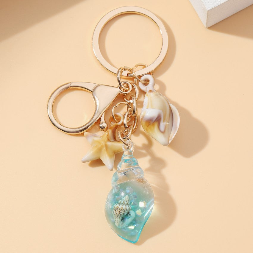 Wholesale Seaside vacation luminous conch Acrylic keychain