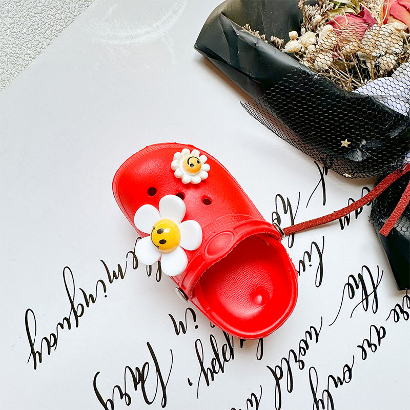 Zapatillas de cara sonrientes al por mayor soporte de airbag de teléfono móvil de plástico