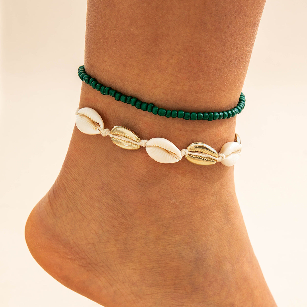 Two pieces of hand-woven anklets from shells
