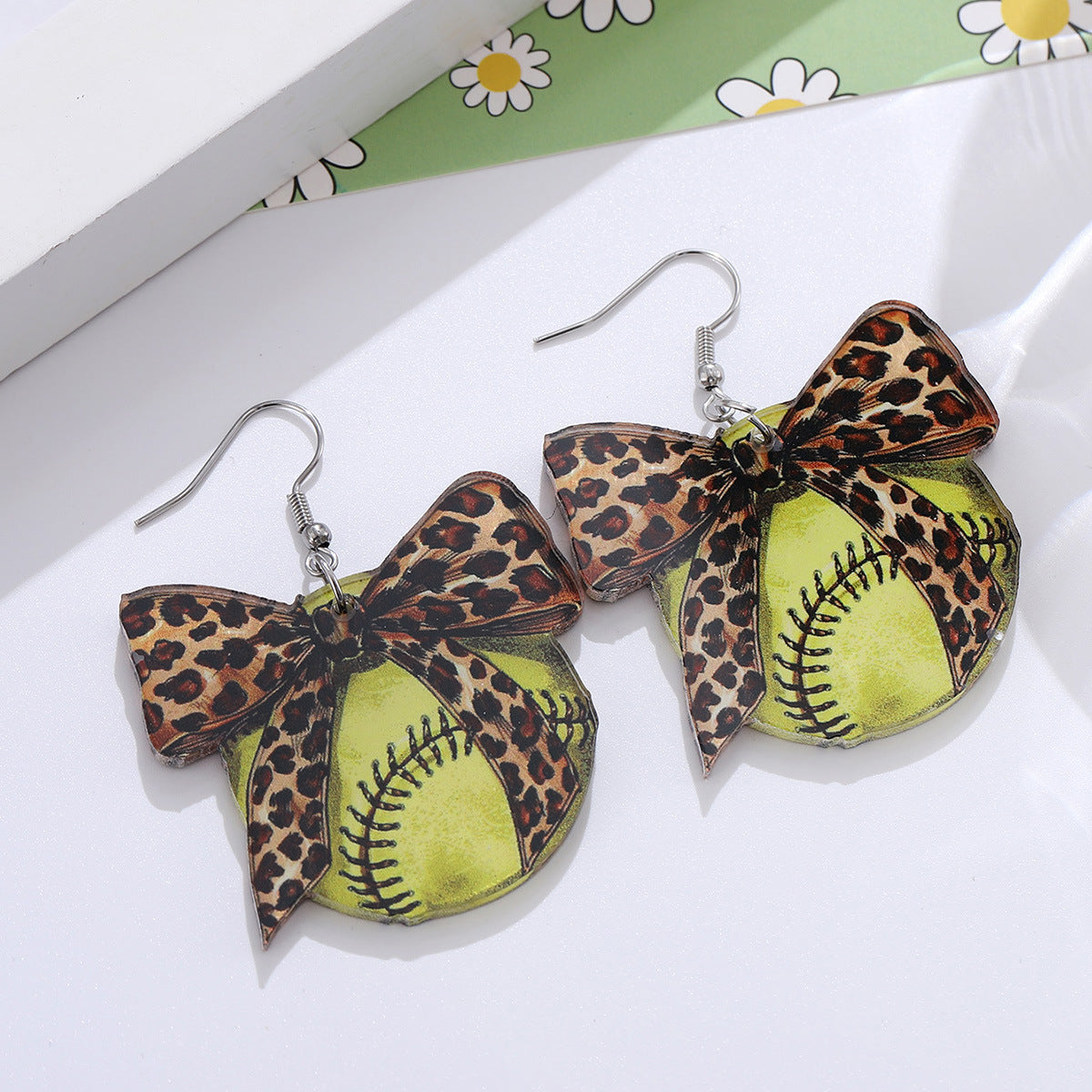 Wholesale sporty polka dot bow pendant earrings