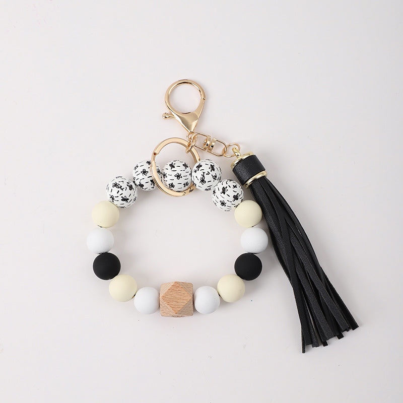 Llavero de muñeca de silicona de borla al por mayor