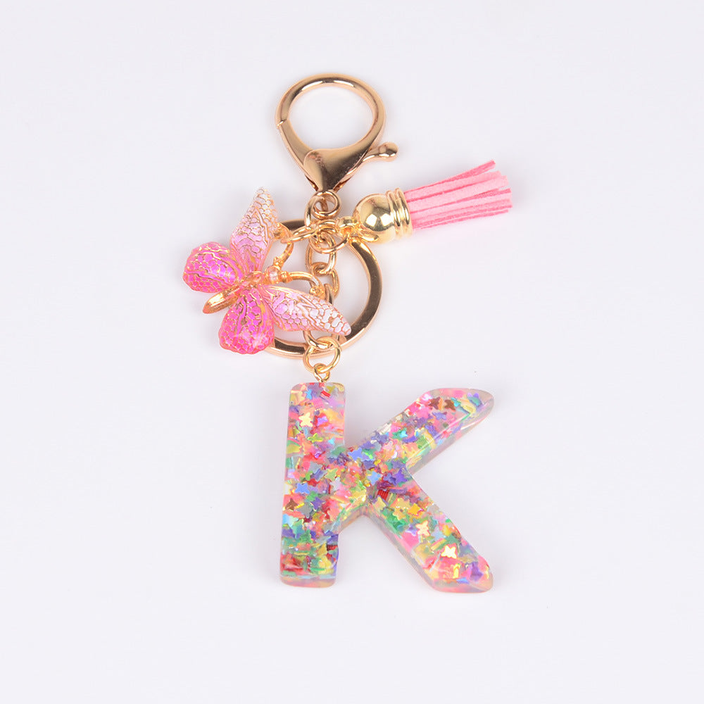 卸売スパンコール英語蝶タッセル文字樹脂キーホルダー