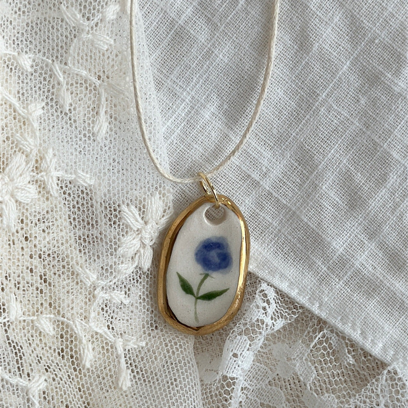 Wholesale rabbit flower print pendant stainless steel necklace