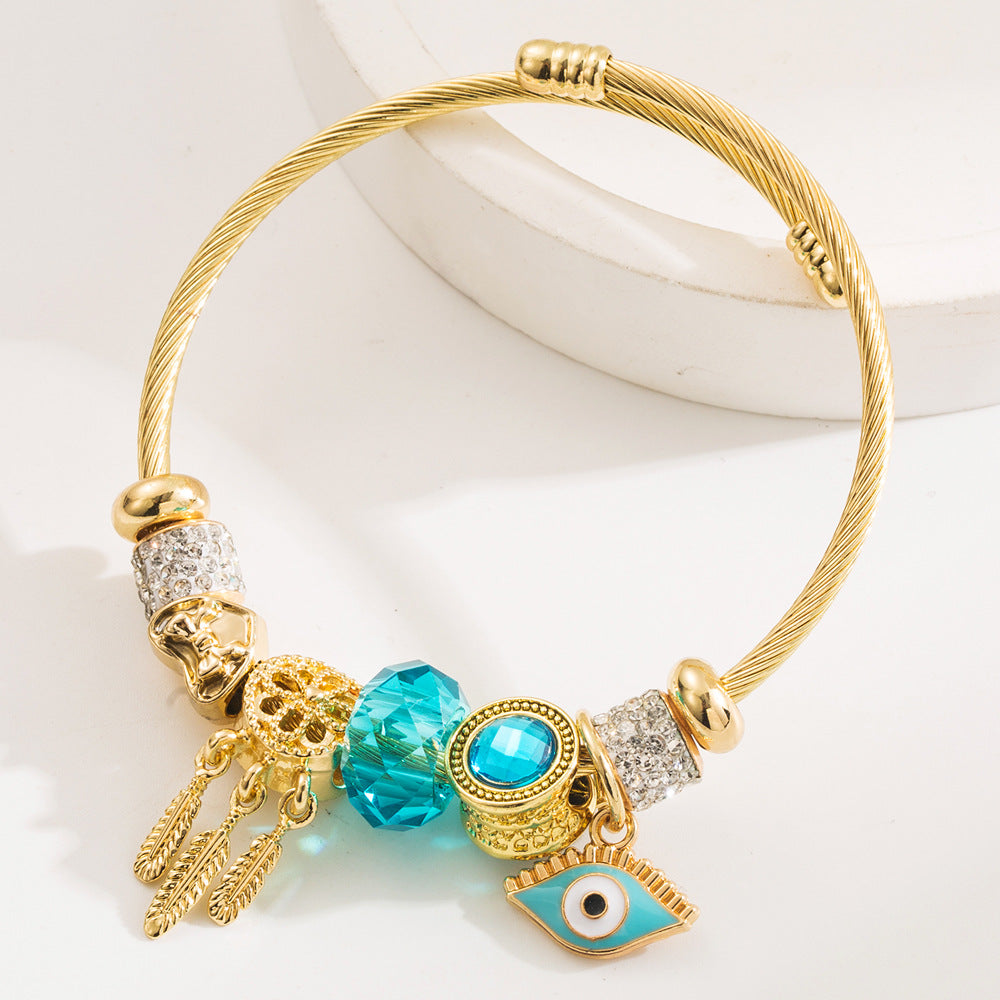 Wholesale Golden Devil' s Eye Diamond Pendant Stainless Steel Bracelets