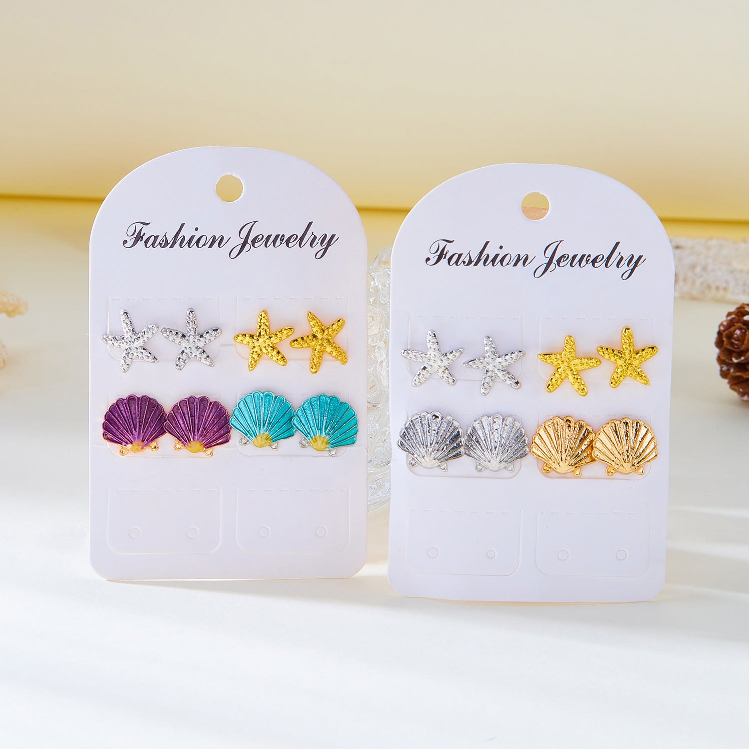 Wholesale Small fresh oil drop starfish shell earrings set