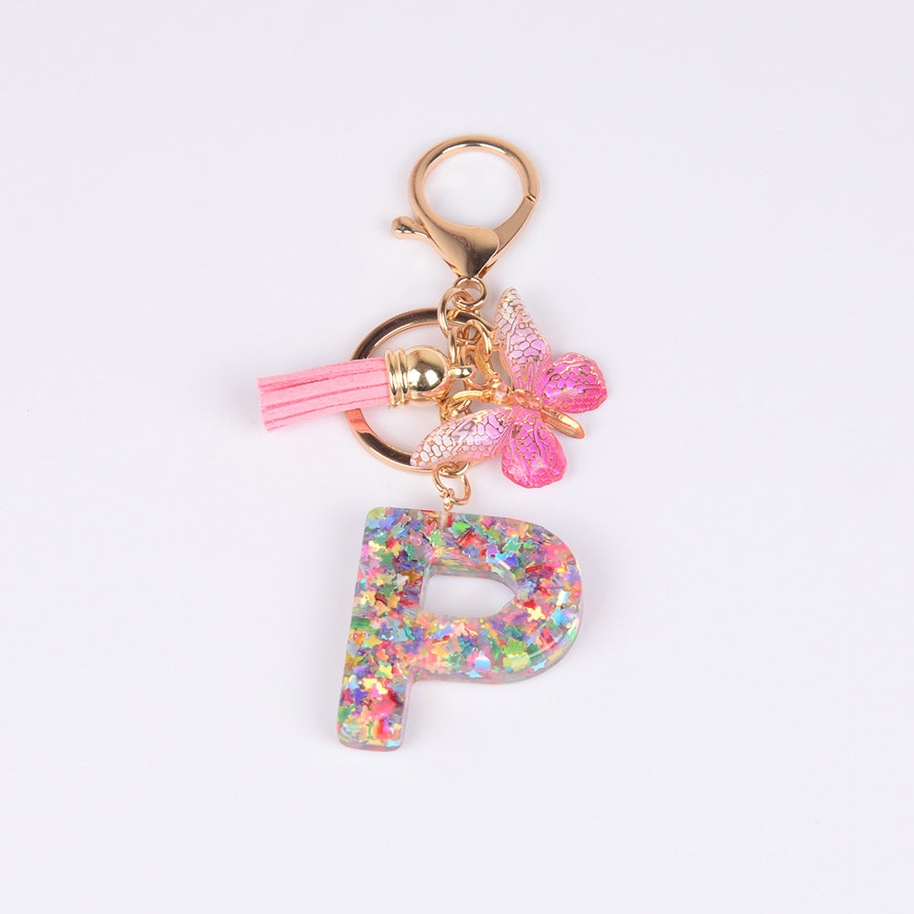卸売スパンコール英語蝶タッセル文字樹脂キーホルダー