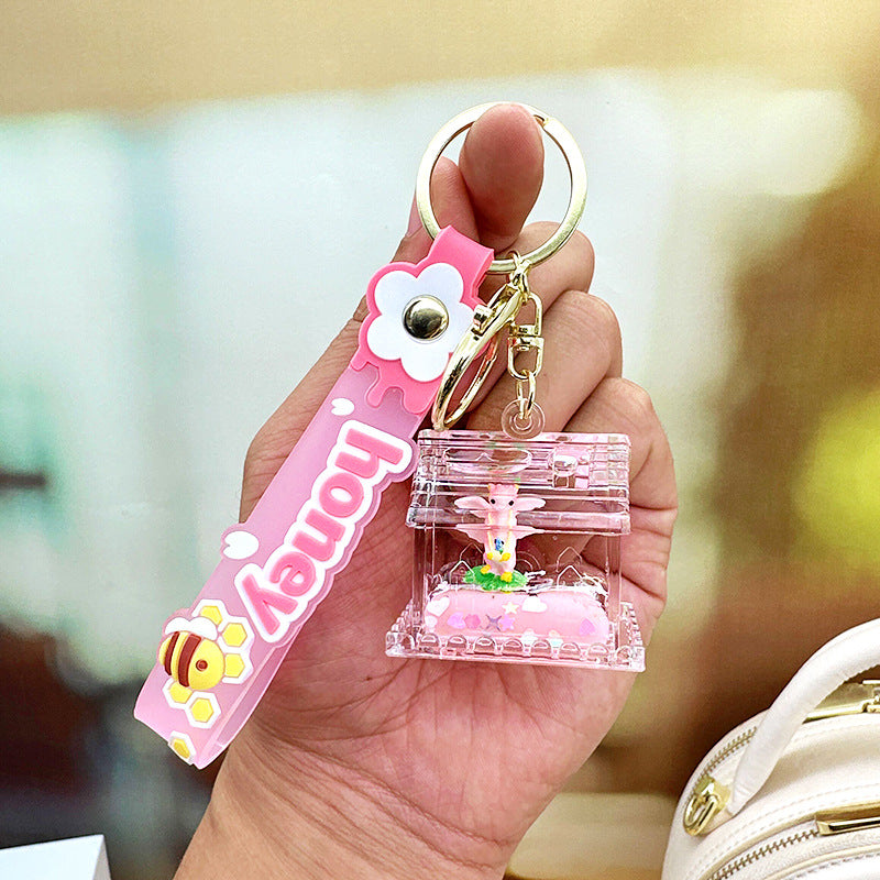 Wholesale Cute Dinosaur House Floating Quicksand Acrylic Liquid Keychain
