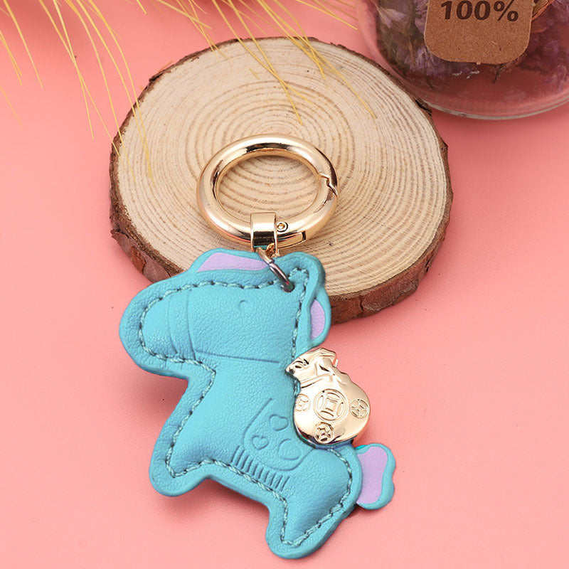 Wholesale Immediately get rich handmade cow leather car keychain pendant