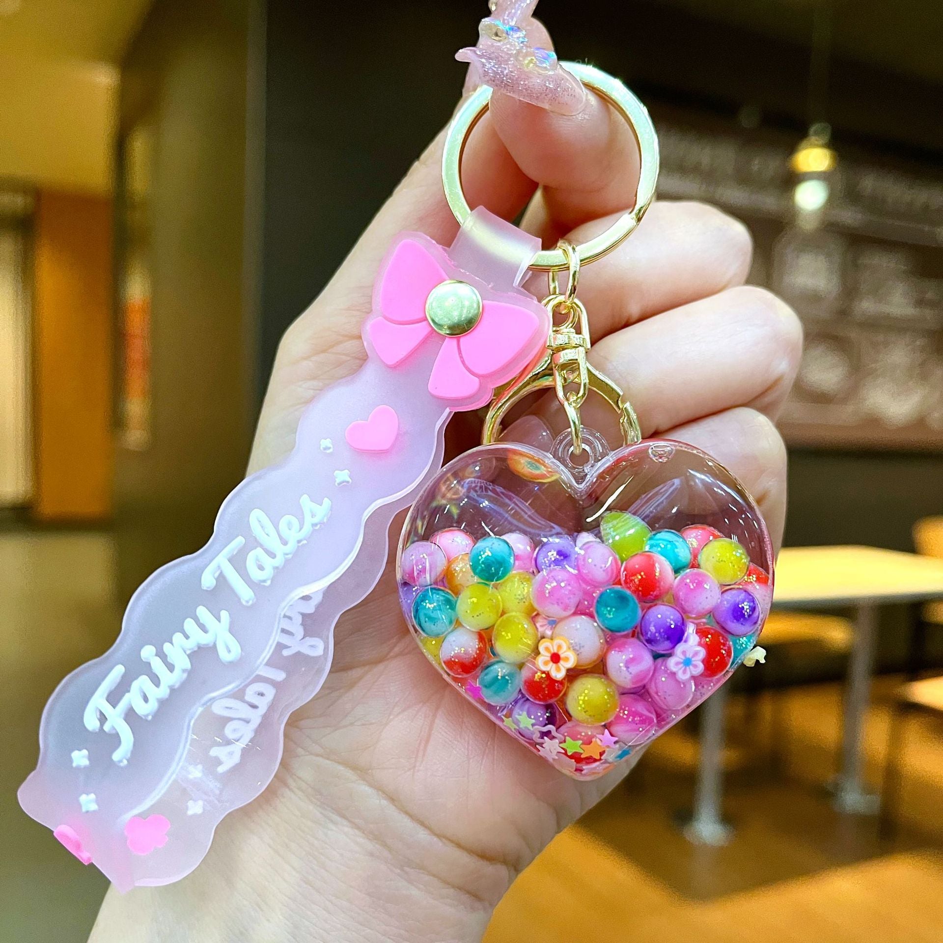 Wholesale Creative Summer Colorful Sand Heart Glow-in-the-Dark Keychain