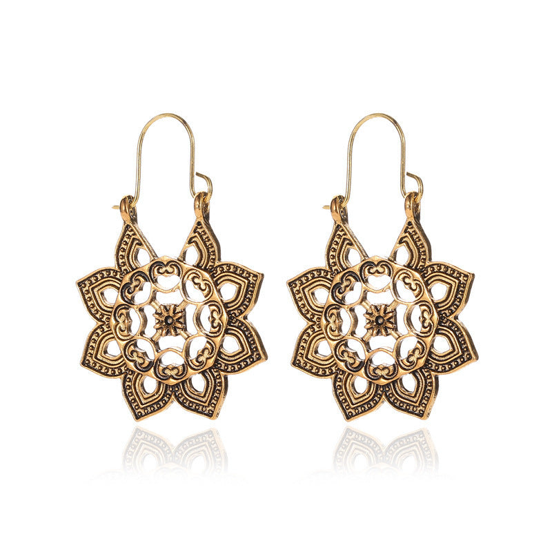 Wholesale Retro Metal Hollow Flower Bohemian Carved Court Style Earrings