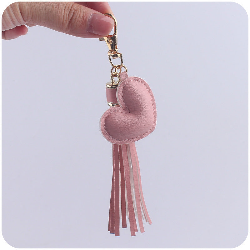 Llavero de borla de cuero de corazón al por mayor