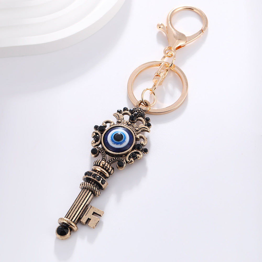 Wholesale Devil' s Eye Key Shape with Water Diamond Metal Keychain