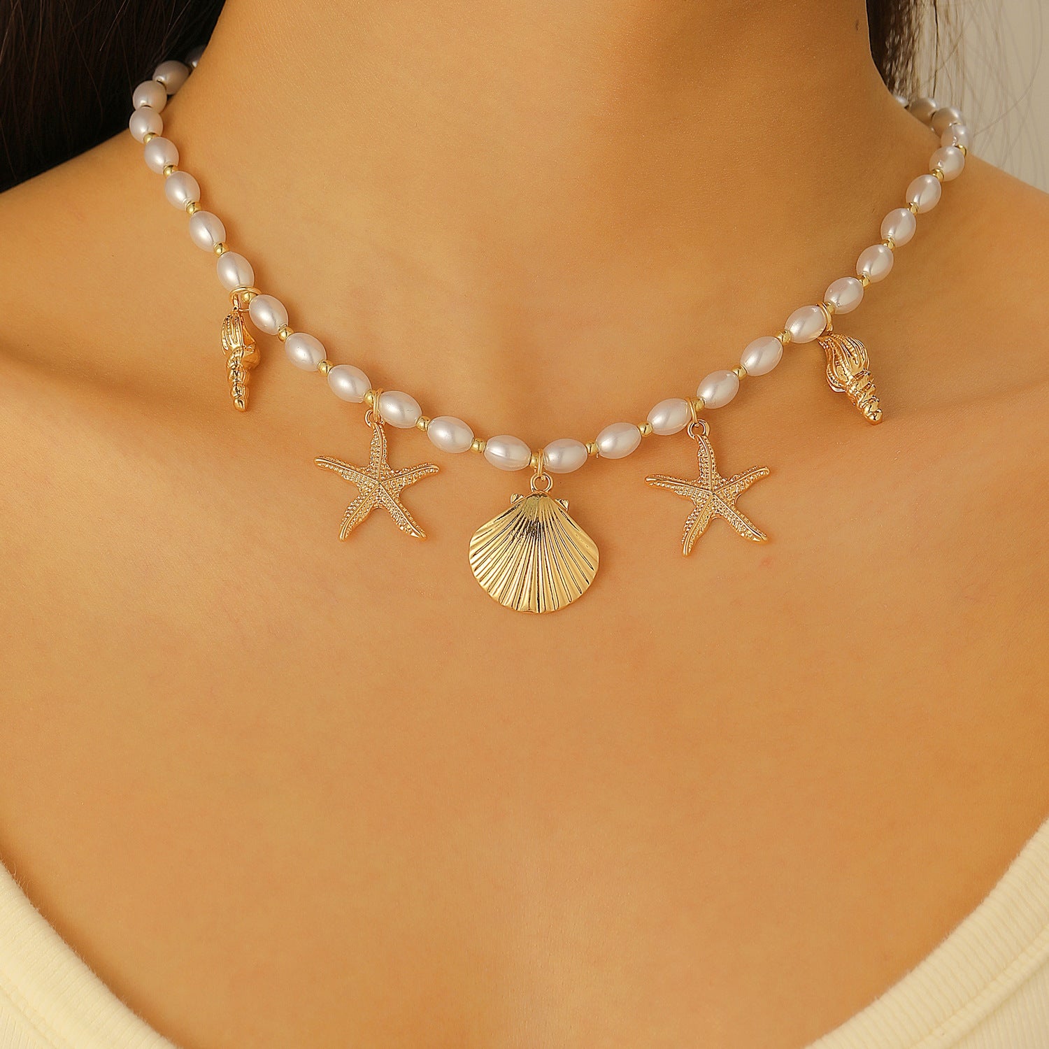 Wholesale Electroplated Alloy Bohemian Beach Shell Necklace And Bracelet Set For Women Faux Pearl Starfish Conch Fashion Accessory