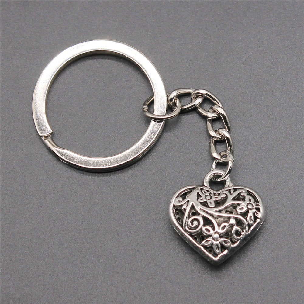 Wholesale 10PCS Three-dimensional Hollow Heart Pendant Metal Keychain