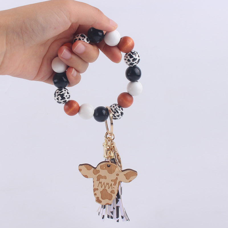 Wholesale Cartoon Western Cow Head Brand Silicone Beaded Wrist Keychain