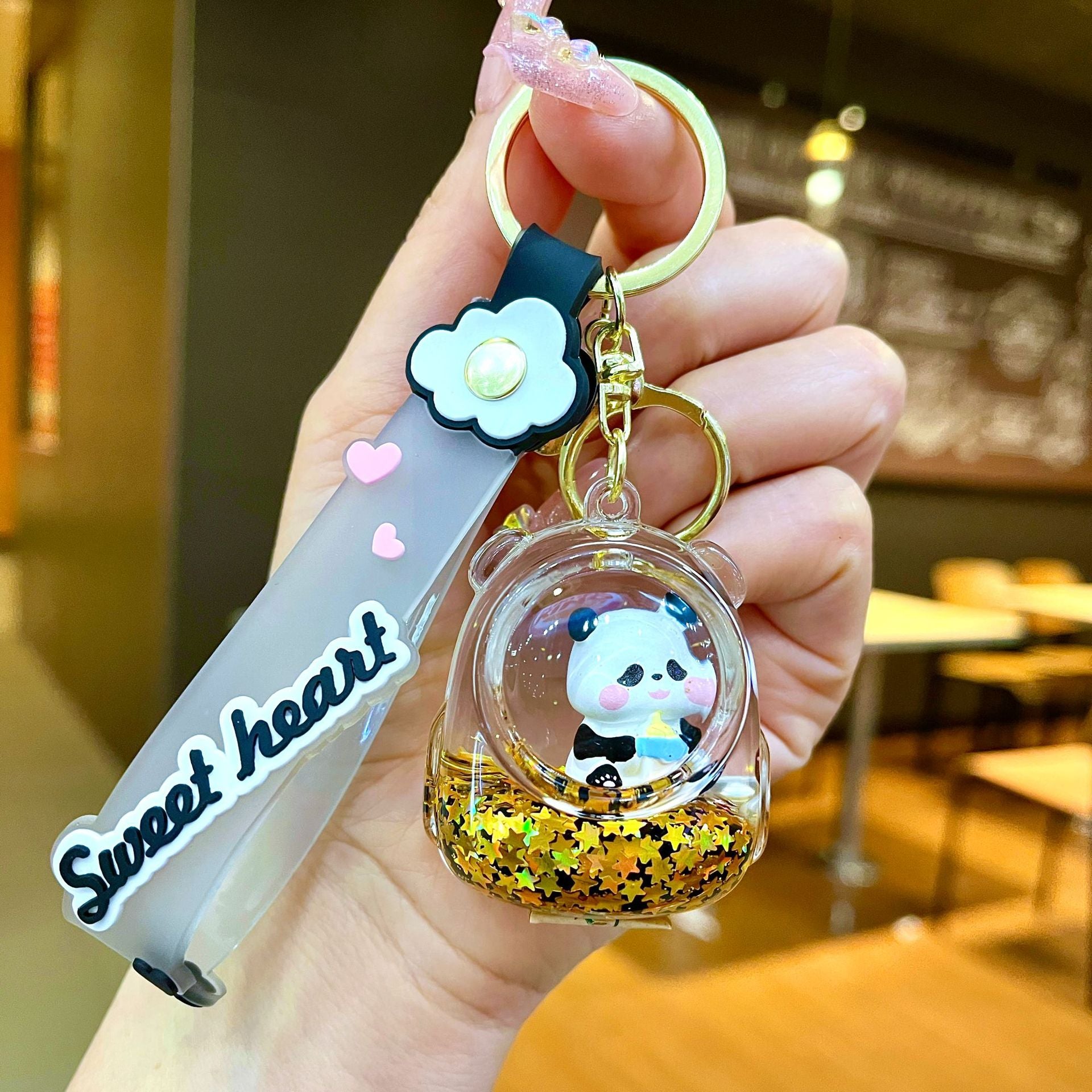 Wholesale Black gold floating cartoon cute panda Liquid Keychains